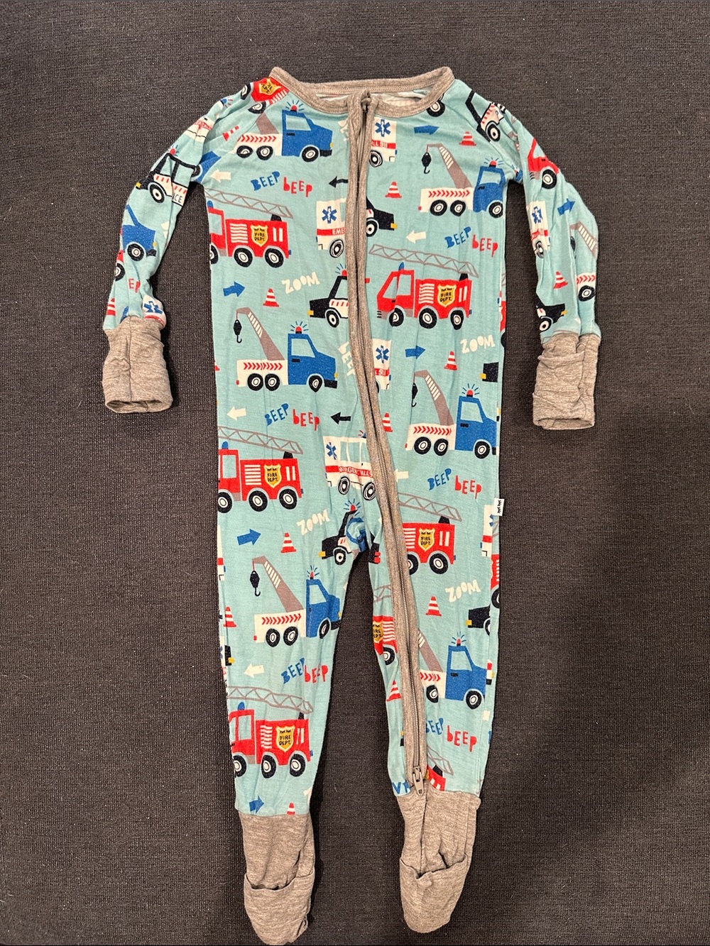 Little Sleepies Light Blue Footed One-Piece with emergency vehicles. Size 6-12M